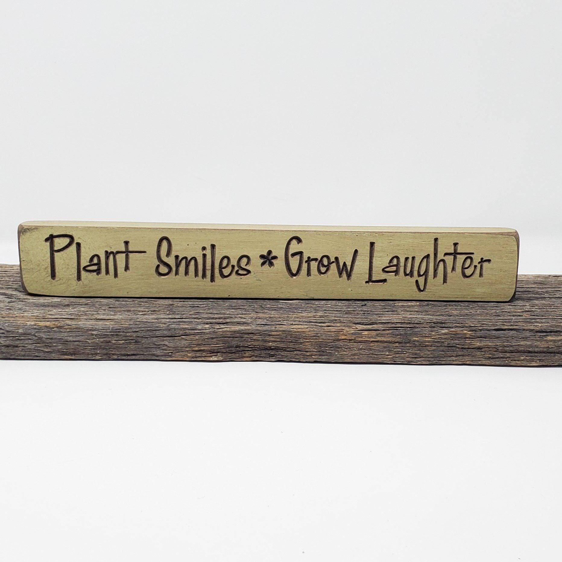 Plant Smiles Grow Laughter Engraved Wood Sign - A Rustic Feeling