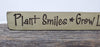 Plant Smiles Grow Laughter Engraved Wood Sign - A Rustic Feeling