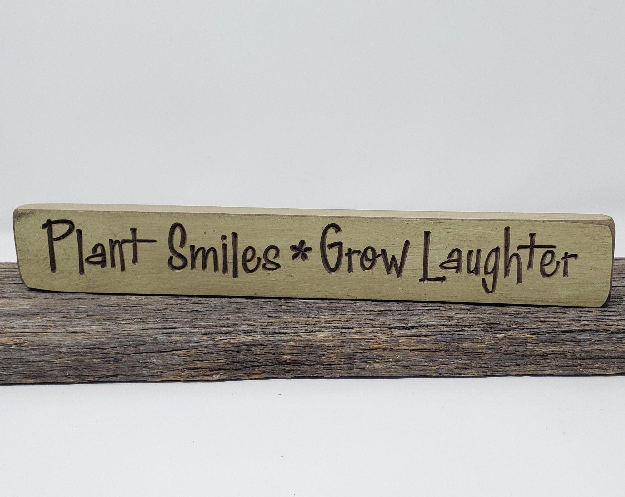 Plant Smiles Grow Laughter Engraved Wood Sign - A Rustic Feeling