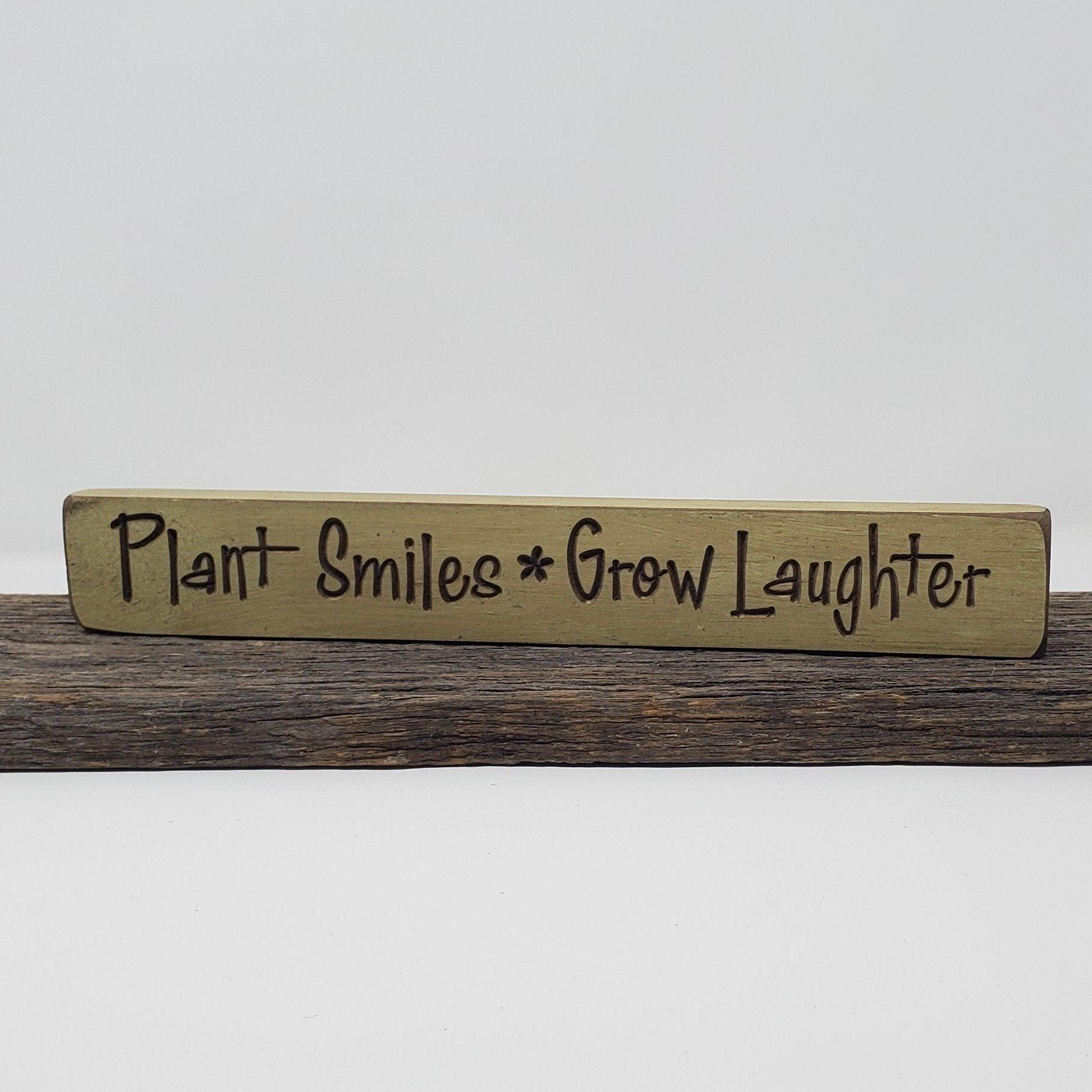 Plant Smiles Grow Laughter Engraved Wood Sign - A Rustic Feeling