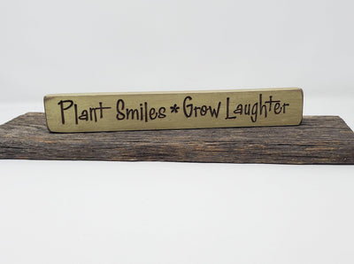 Plant Smiles Grow Laughter Engraved Wood Sign - A Rustic Feeling