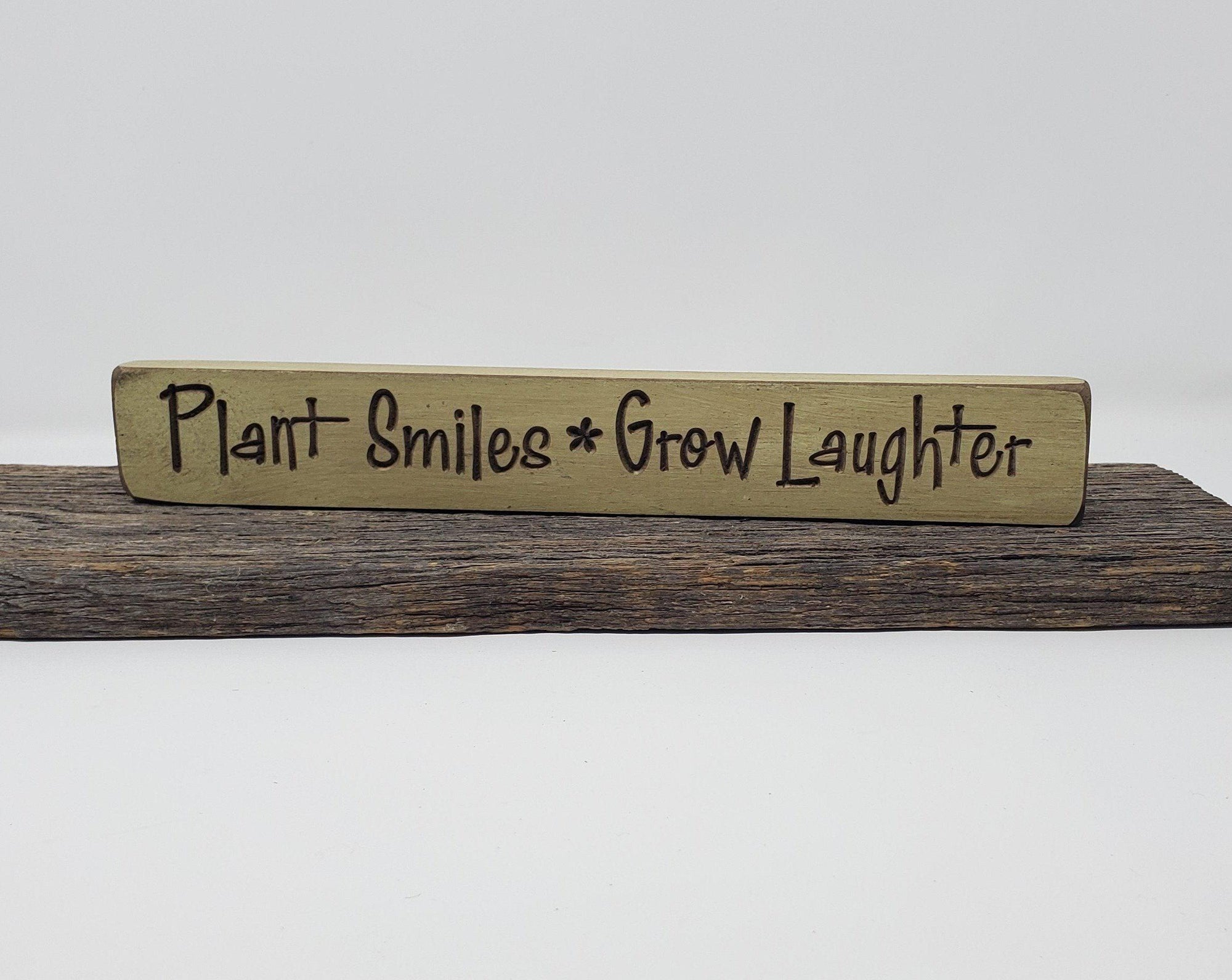 Plant Smiles Grow Laughter Engraved Wood Sign - A Rustic Feeling