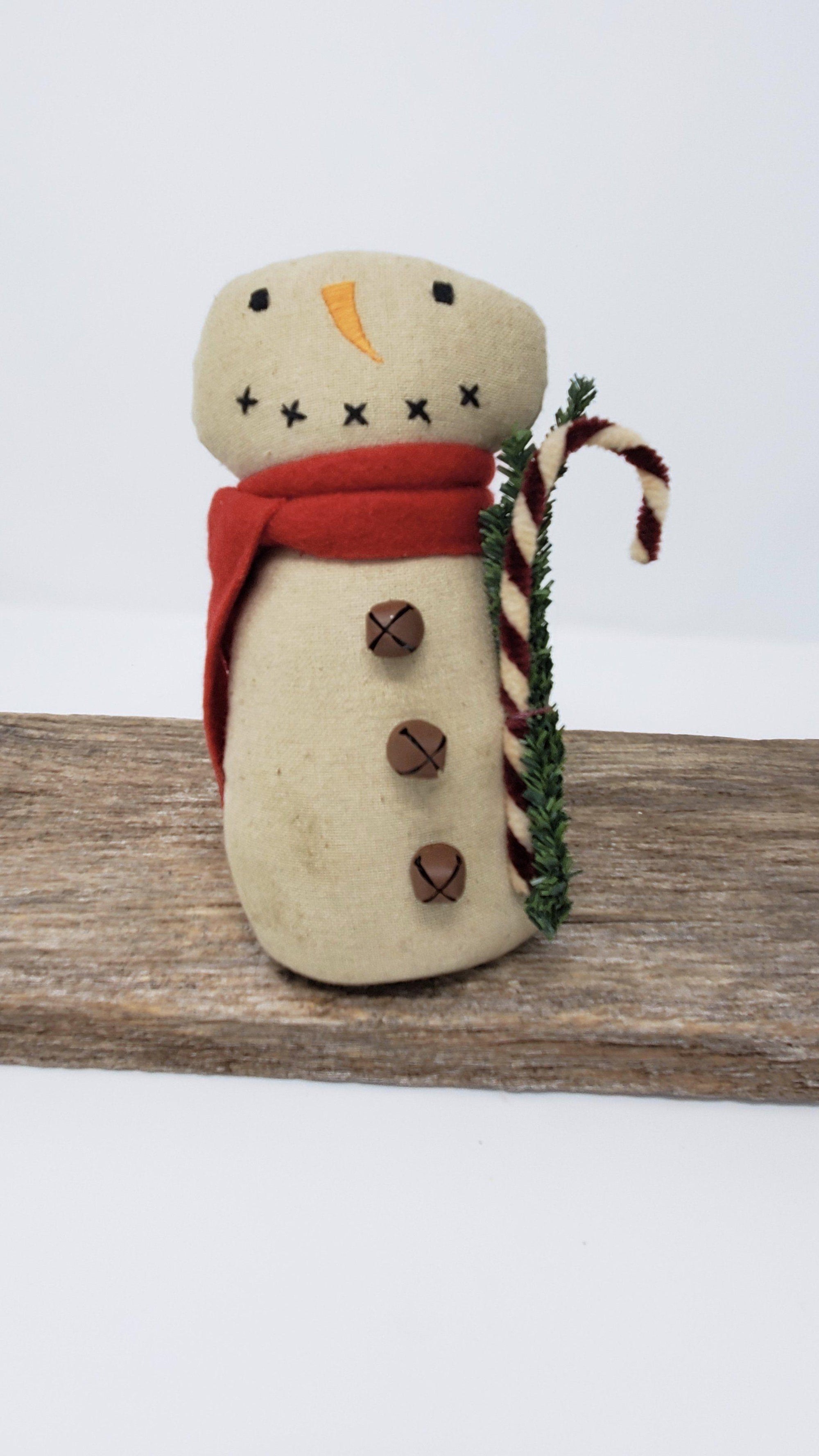 Primitive Snowman with Candy Cane - A Rustic Feeling